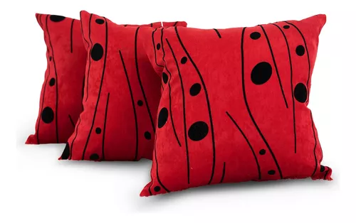 COJÍN ROJO CON CÍRCULOS NEGROS