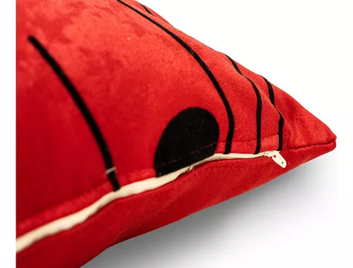 COJÍN ROJO CON CÍRCULOS NEGROS